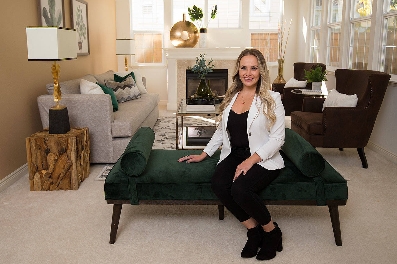 Tanya Nazariya, owner of Brilliant Staging & Design in Everett, shows off her work at a home she is staging with a bachelor-style redesign theme. Nazariya givers tips for how guys can move beyond a "dorm room" look on Tuesday, Oct. 1, 2019 in Mill Creek, Wash. (Andy Bronson / The Herald)