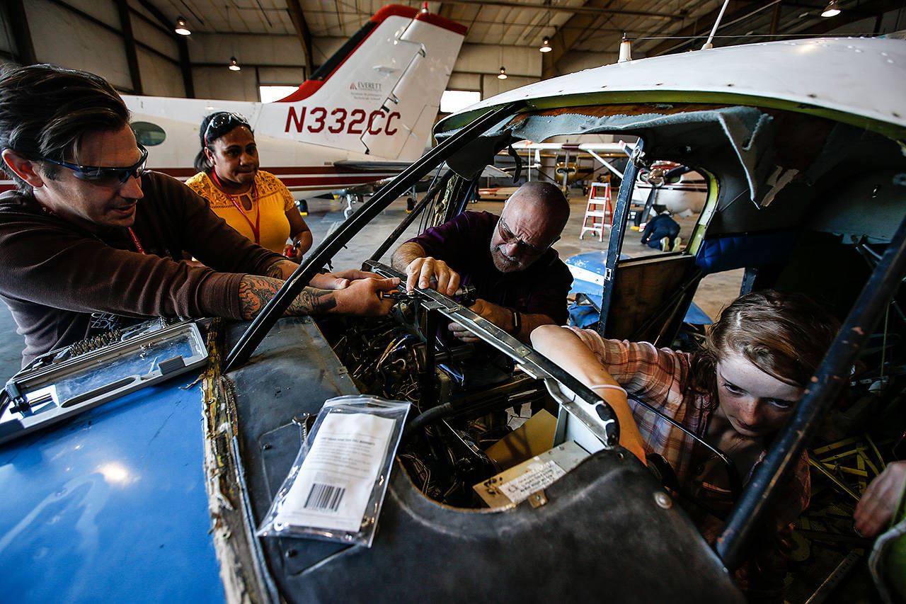 Ana Naulivov (second from left) is one of a handful of female students in the Aviation Maintenance Technology program at Everett Community College. (Ian Terry / Herald file)