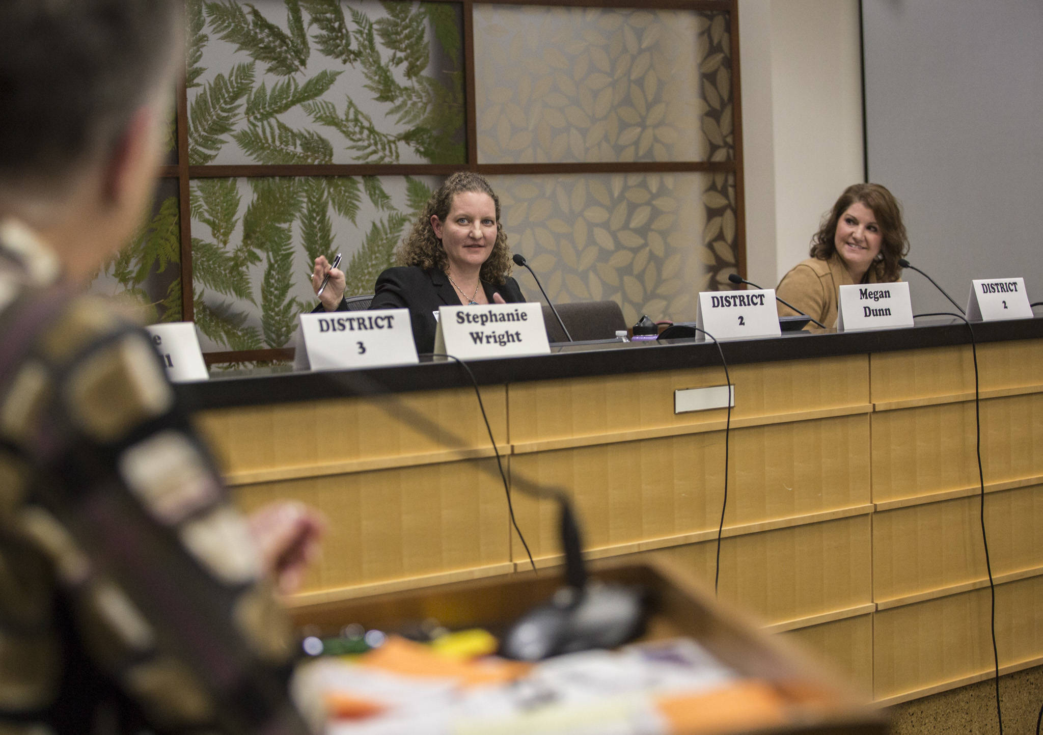 Snohomish County District 2 candidates Megan Dunn (left) and Anna Rohrbough speak at the League of Women Voters candidate forum at the Snohomish County Campus on Oct. 7 in Everett. (Olivia Vanni / The Herald)