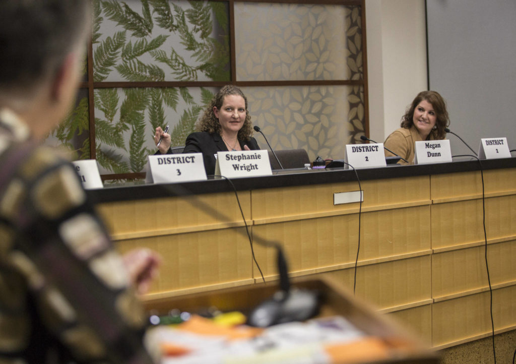 Snohomish County District 2 candidates Megan Dunn (left) and Anna Rohrbough speak at the League of Women Voters candidate forum at the Snohomish County campus on Oct. 7 in Everett. (Olivia Vanni / The Herald)
