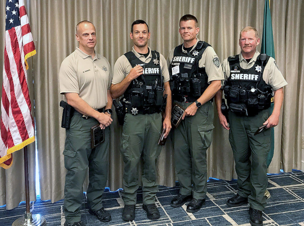 Sgt. Greg Sanders (left), Marine Services supervisor at Snohomish County Sheriff’s Office, was among those honored by Washington State Parks Boating Program for outstanding accomplishments and contributions. (Submitted photo)
