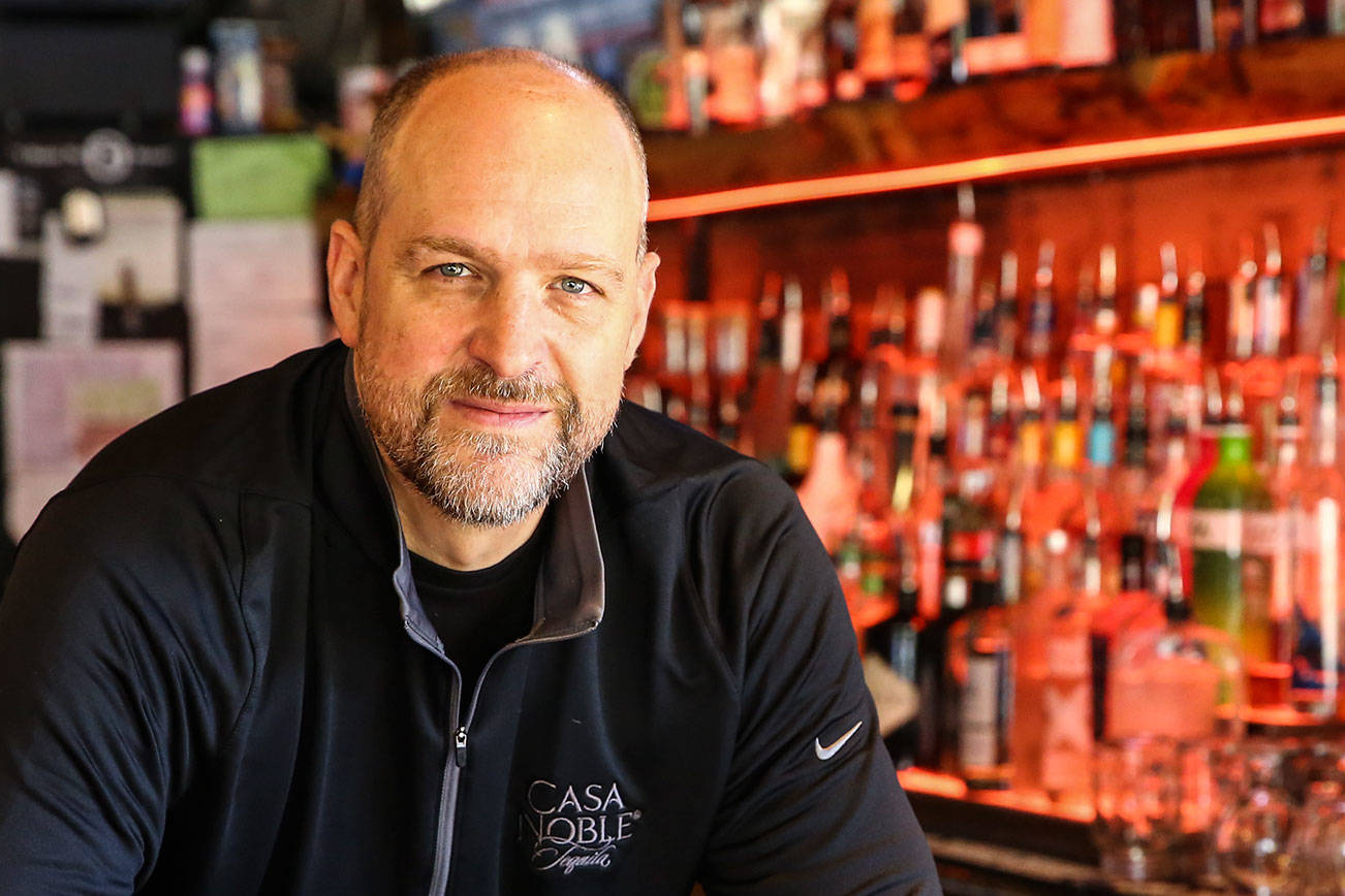 Mark Evich is the bar manager of The Cove Restaurant and Lounge in Lynnwood. With a career spanning 28 years, he calls himself a “sage.” (Kevin Clark / The Herald)