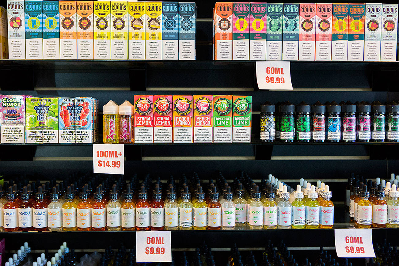 Different brands and flavors of vape juice on sale in response to the potential ban on Tuesday, Oct. 1, 2019 in Everett, Wash. (Olivia Vanni / The Herald)