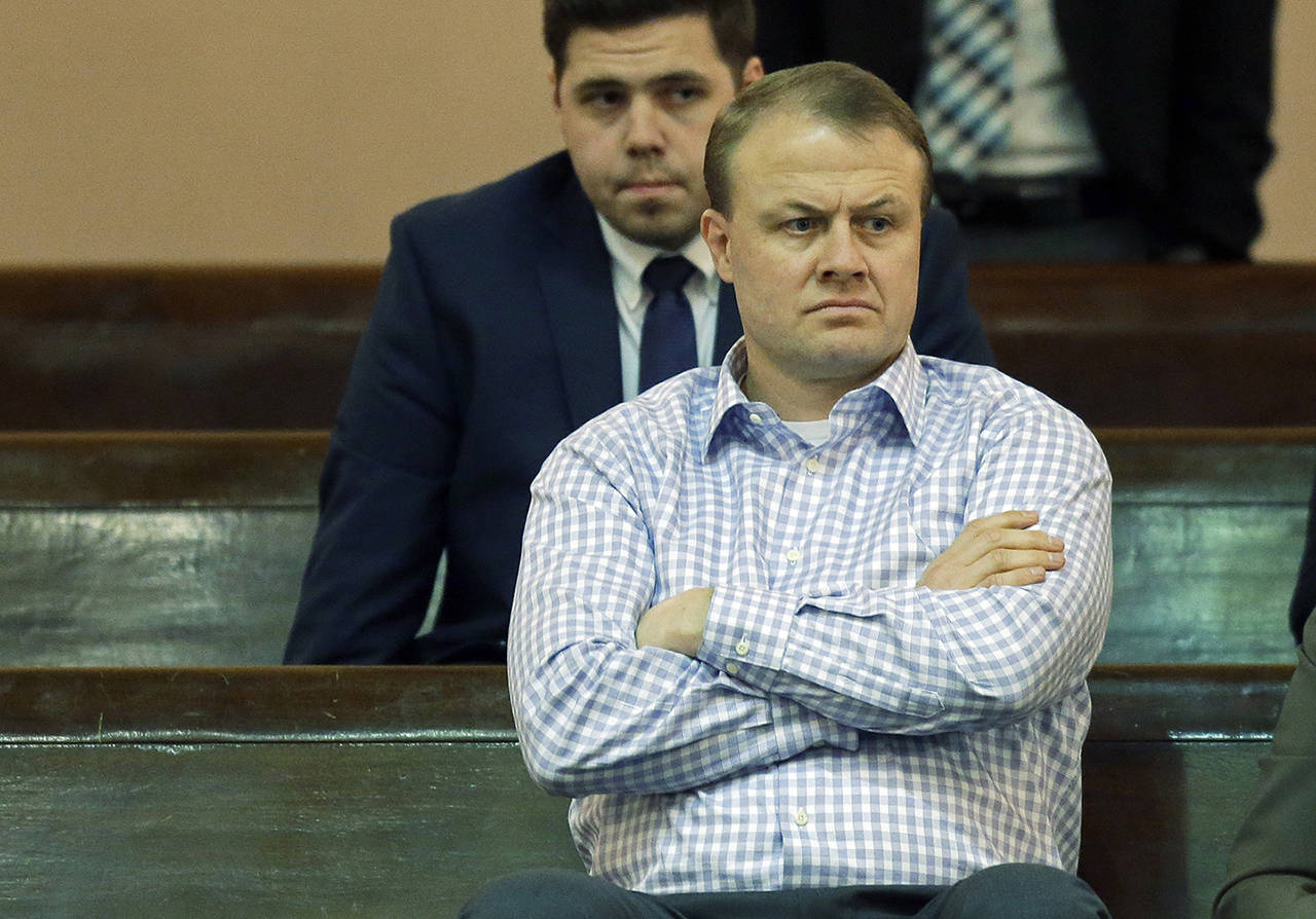 Anti-tax campaigner Tim Eyman sits in the Senate gallery in 2017, in Olympia during a debate on whether to vote on the levy cliff bill. (AP Photo/Ted S. Warren)