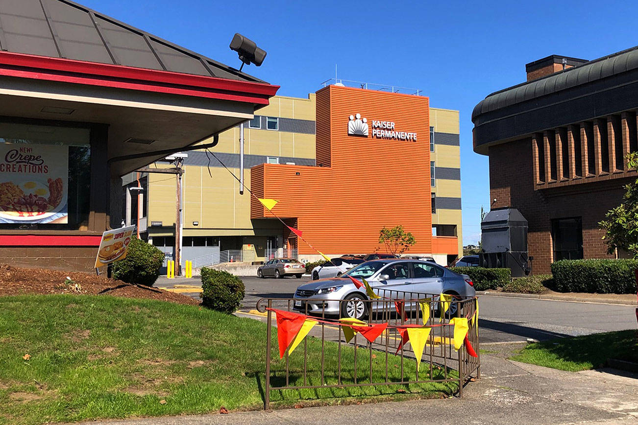 Kaiser Permanente Washington is in the process of acquiring three properties near its existing building on Maple Street to expand operations. (Lizz Giordano / The Herald)