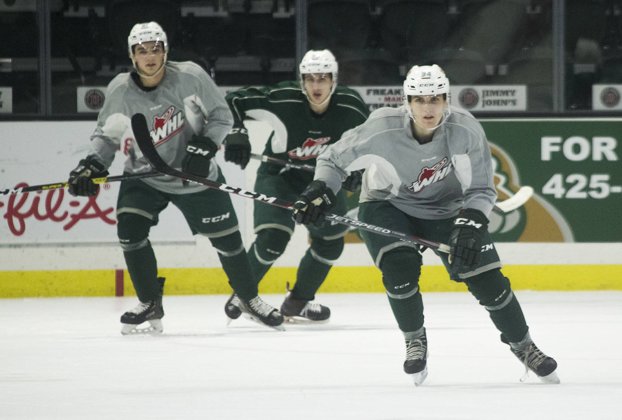 The Silvertips’ Tyson Phare (right) practices with the team on Oct. 3, 2019, at the Angel of the Winds Arena in Everett. (Andy Bronson / The Herald)