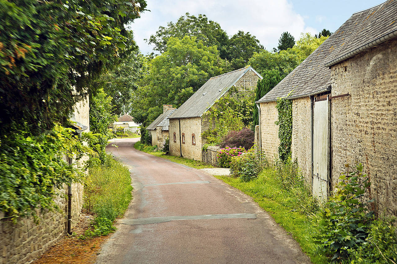 Normandy’s little lanes, cute stone houses and lush greenery are irresistible. (Rick Steves’ Europe)