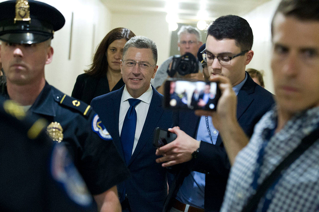 Kurt Volker, a former special envoy to Ukraine, is leaving after a closed-door interview with House investigators as House Democrats proceed with the impeachment investigation of President Donald Trump, at the Capitol in Washington on Thursday. (AP Photo/Jose Luis Magana)