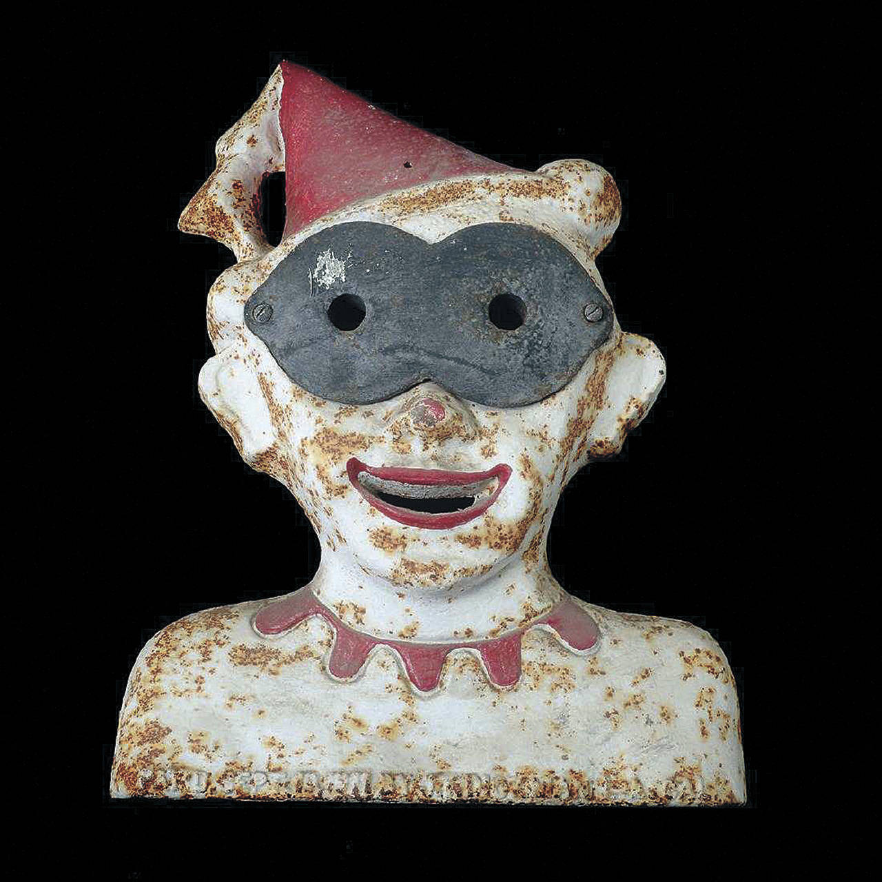 This heavy 20-inch-tall head is made of iron. It was painted red and white. The auction catalog said it was a clown because of the pointed hat with a tassel. It’s a not-very-funny shooting gallery target that pictures a clown with a mask. It was made in America and used around 1911. The strange item was wanted by many collectors, and the high bid was $12,000. (Cowles Syndicate)