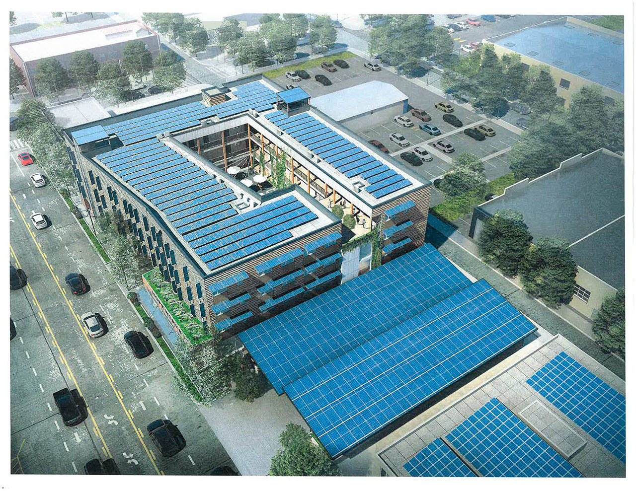 Artworks shows an aerial view of HopeWorks Station’s Phase 11, the 65-unit supportive housing and career training project that opens this week. Solar panels on the buildings’ roofs are expected to provide all of the electricity for the development’s residential floors. (Courtesy of HopeWorks)