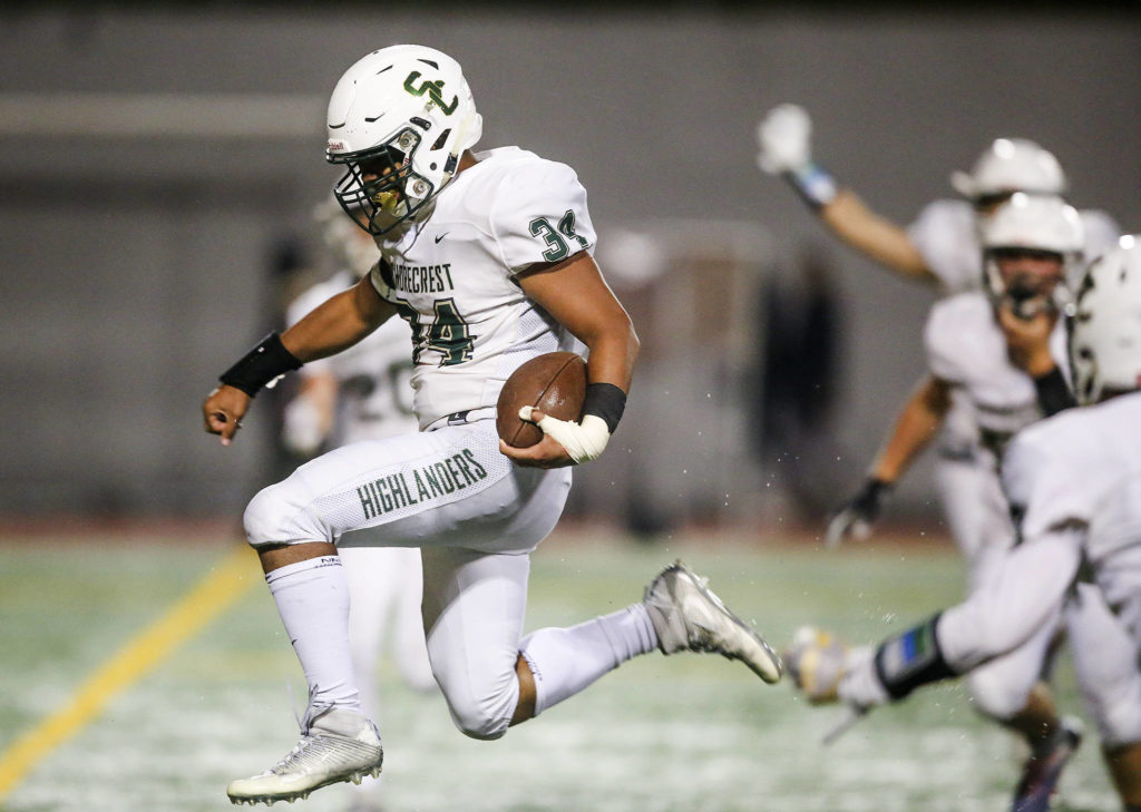 Shorecrest’s Marcus Tidwell leaps into the end zone for the winning two-point conversion to give the win as Shorecrest beat Snohomish 36-35 at Veterans Stadium at Snohomish High School on Friday, Oct. 4, 2019 in Snohomish, Wash. (Andy Bronson / The Herald)
