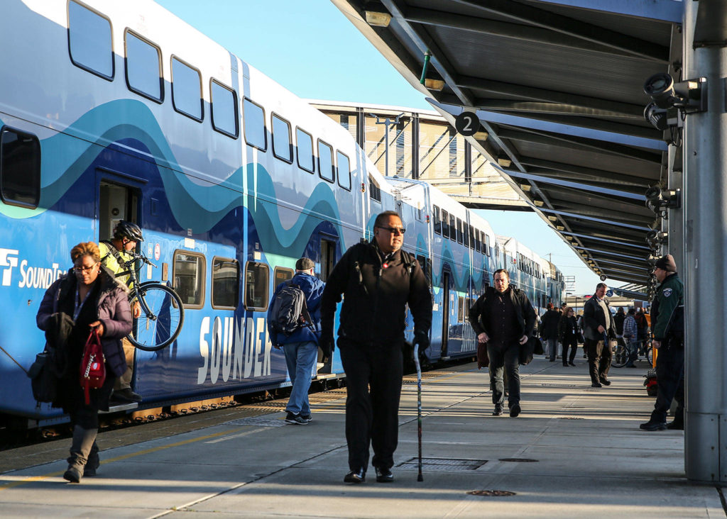 If voters pass Initiative 976, a stream of dollars used for maintaining highways, repairing bridges, operating buses and expanding light rail would start to dry up. This could put at risk the light rail extension to Everett, which is set to arrive to the Everett Station area in 2036. (Kevin Clark / The Herald)
