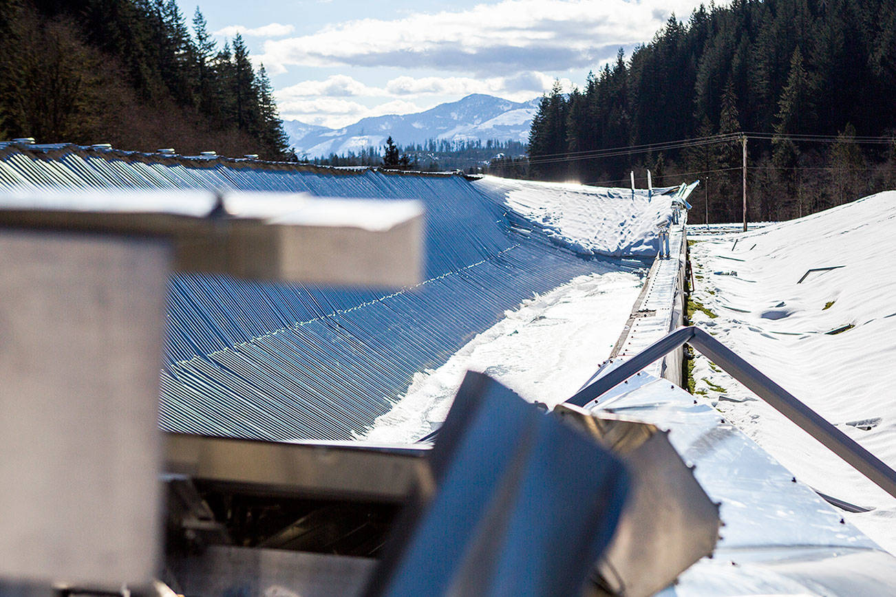 Ice and snow sit on top of a storage basin’s collapsed roof at the city of Everett’s water filtration plant near Monroe after the damage occured in February. (Olivia Vanni / Herald File)