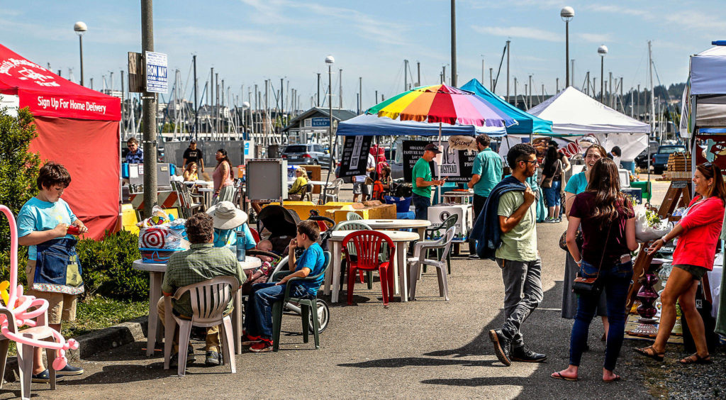 Crowds enjoyed the Everett Farmers Market at its waterfront location in June. (Dan Bates / Herald file)
