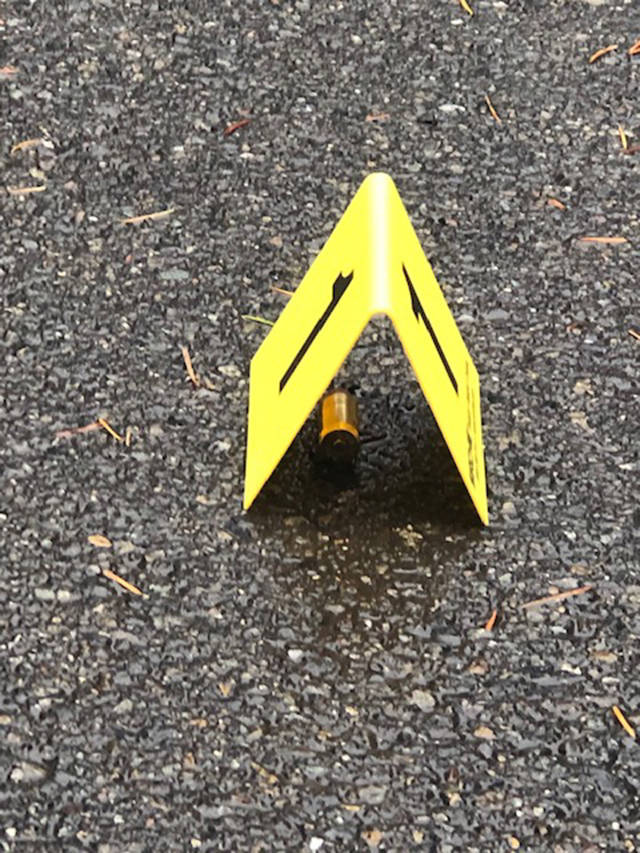 A bullet casing was found on 53rd Avenue West, three houses from the corner of 92nd Street SW near the entrance to a road that leads to the woods. (Andrea Brown / The Herald)