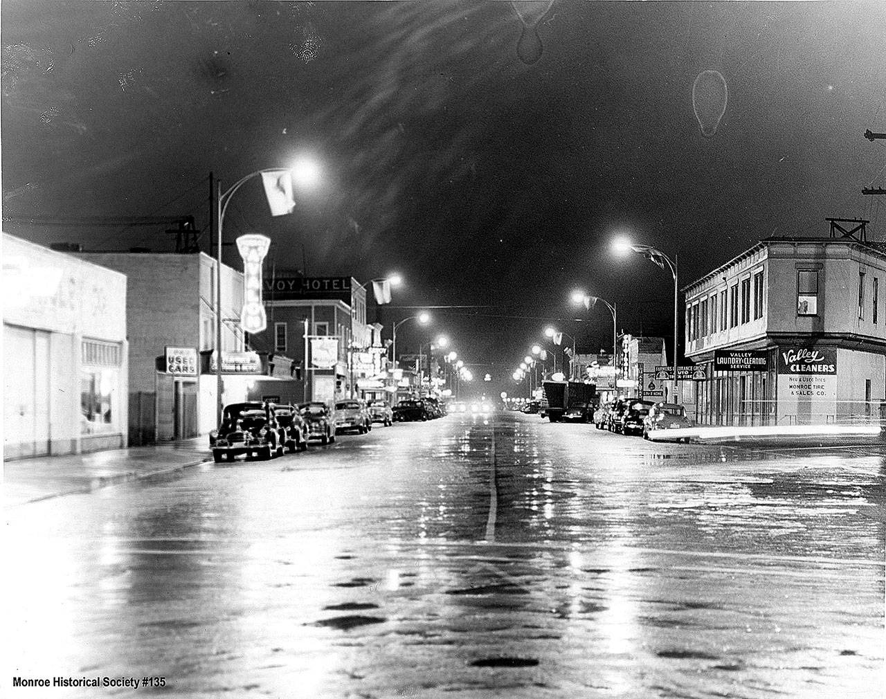 The Avalon Theater, Savoy Hotel and the Hallan Building on Main Street in Monroe, looking east from Madison Street, on Aug. 27, 1951. (Monroe Historical Society)