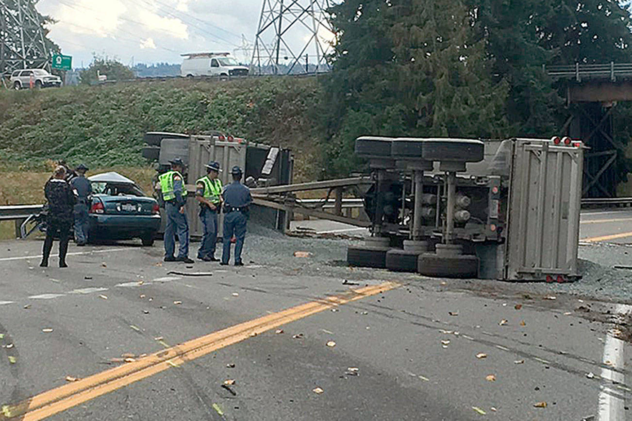 Dump truck, car collide on Highway 9 in Snohomish