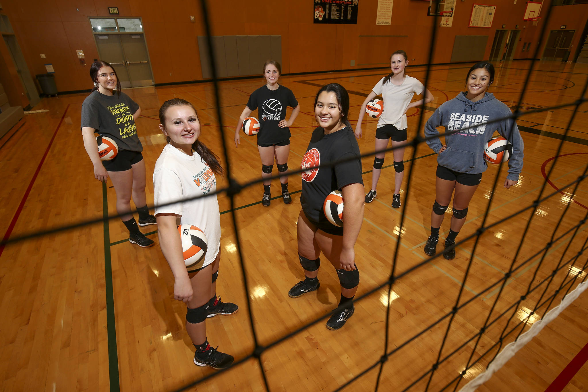 Granite Falls varsity volleyball players (L-R) Rylee Downs, Kendra Sucich, Ashley Palfrey, Vicky Rodenbaugh, Shayli Byde and Jenny Rodenbaugh. (Andy Bronson / The Herald)