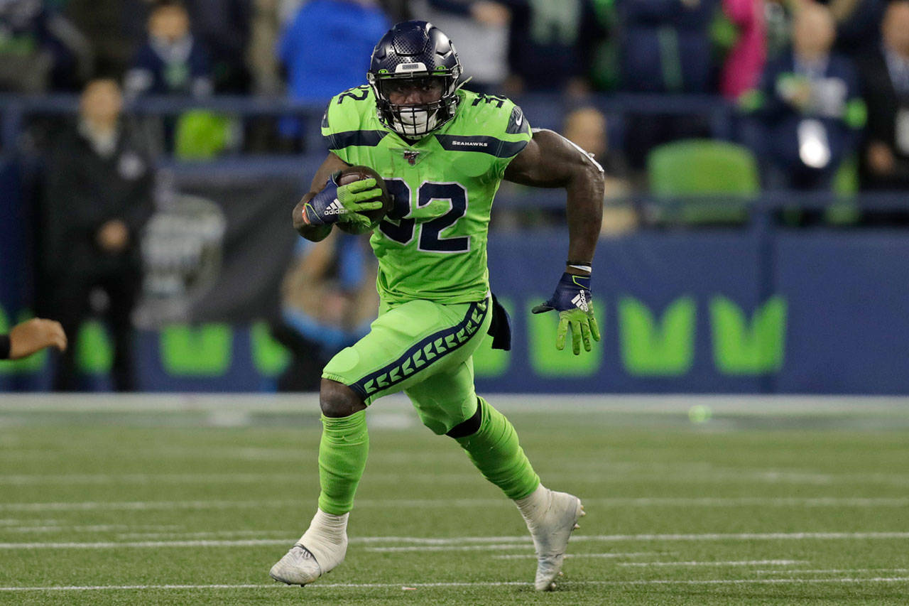 Seahawks running back Chris Carson piled up 118 yards rushing last Thursday in a win over the Rams. (AP Photo/Stephen Brashear)