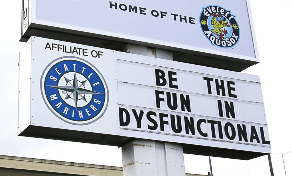 To spice up the &lsquo;boring&rsquo; season, AquaSox employees have begun putting funny sayings on the team&rsquo;s billboard outside Funko Field in Everett. (Andy Bronson / The Herald)
