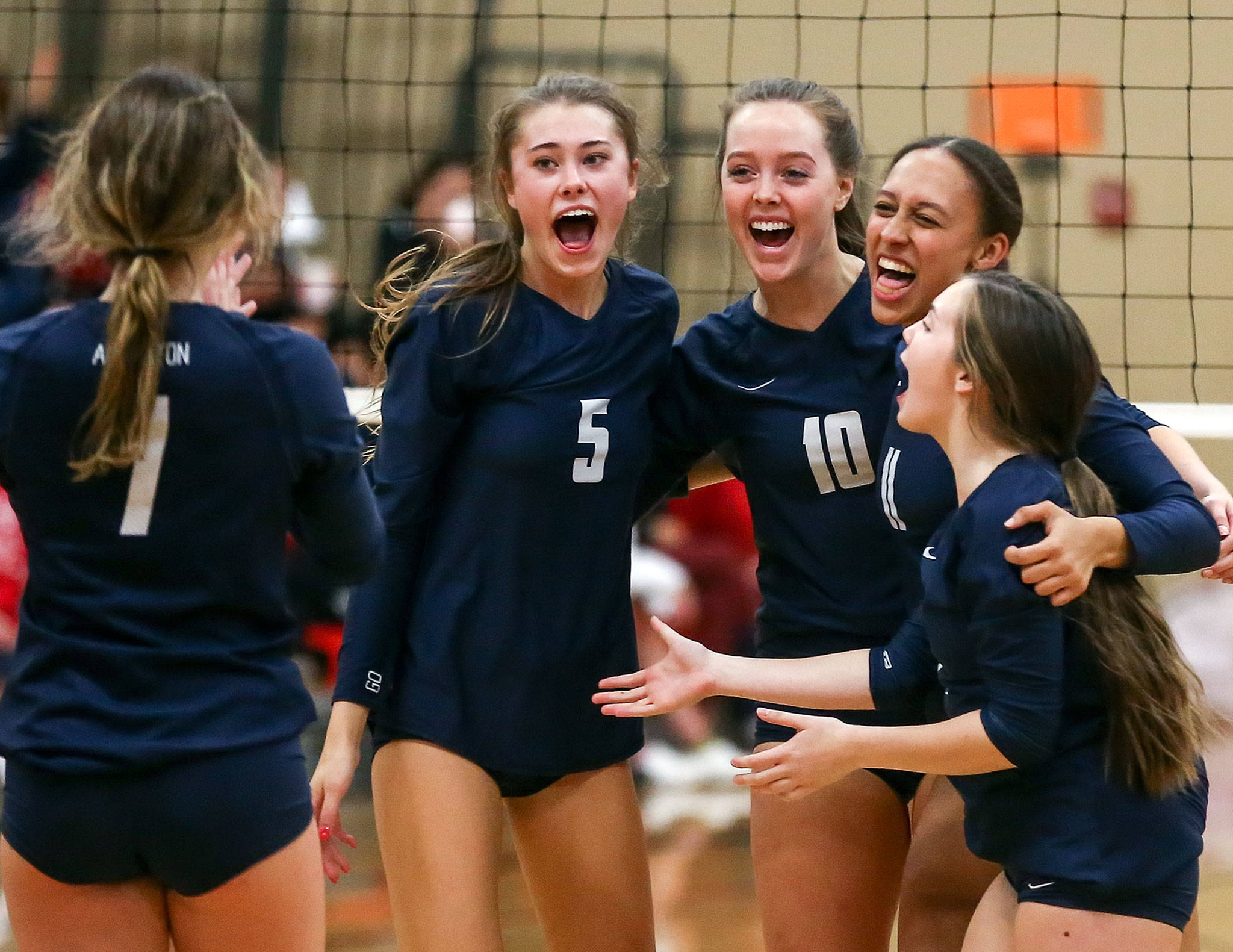 Arlington volleyball players celebrates a point during the Eagles’ 3-0 victory on the road at Snohomish on Thursday in a Wesco 3A/2A showdown between a pair of teams that came into the night undefeated. (Kevin Clark / The Herald)
