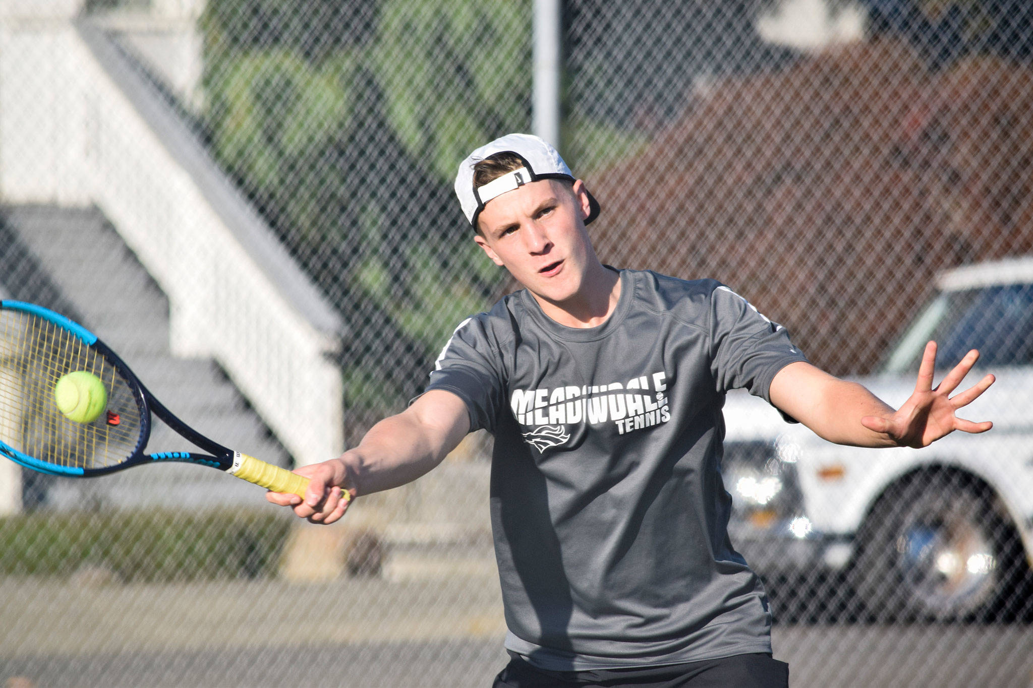 Meadowdale’s Ben Fahey plays doubles against Marysville Pilchuck on Thursday, Oct. 10 at Totem Middle School. (Katie Webber / The Herald)