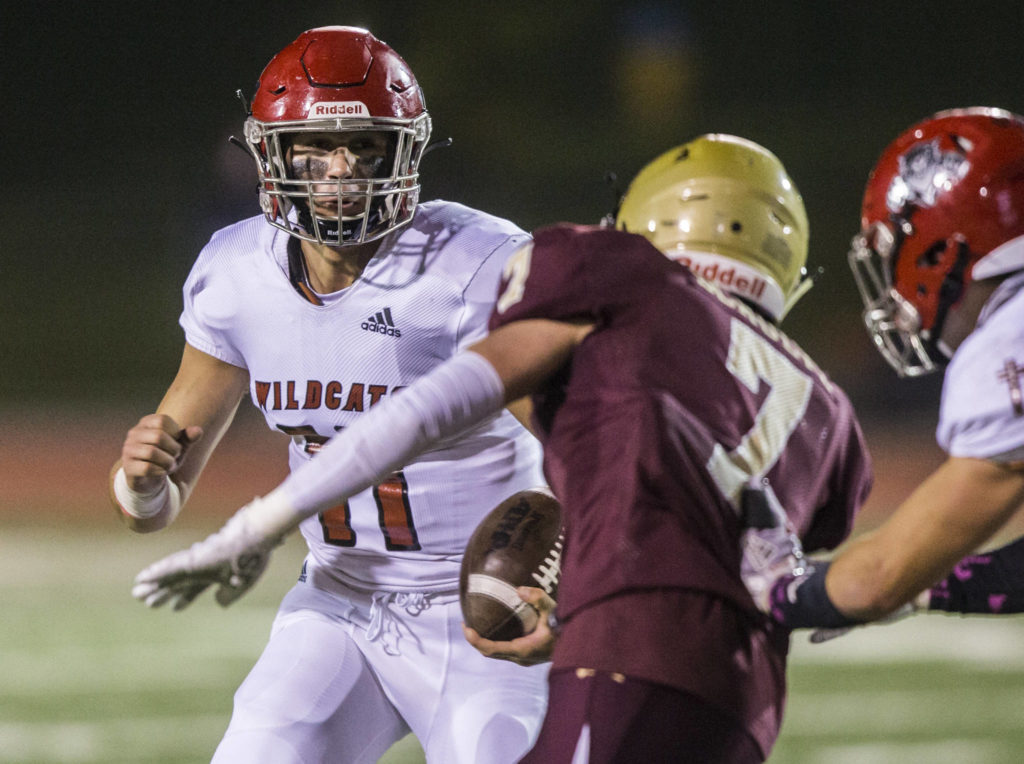 Archbishop Murphy’s Victor Gabalis runs the ball during the game on Friday, Oct. 11, 2019 in Arlington, Wash. (Olivia Vanni / The Herald)
