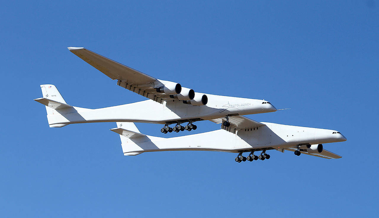 Stratolaunch, a giant six-engine aircraft with the world’s longest wingspan, makes its historic first flight from the Mojave Air and Space Port in Mojave, California, on April 13. Founded by the late billionaire Paul G. Allen, Stratolaunch is vying to be a contender in the market for air-launching small satellites. (AP Photo/Matt Hartman, file)