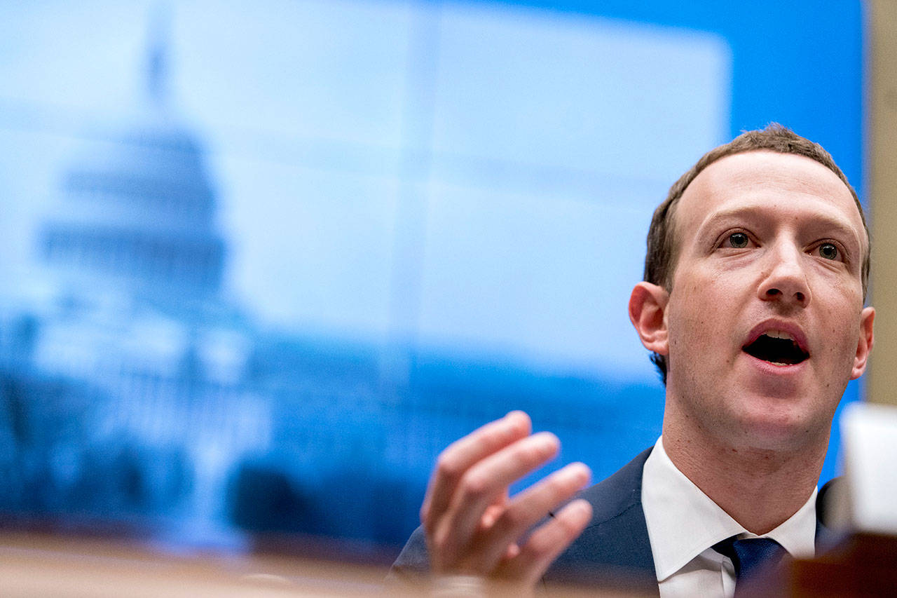 Facebook CEO Mark Zuckerberg testifies before a House Energy and Commerce hearing on Capitol Hill in Washington last April. Facebook faces a rough road ahead with Libra, but defections by high-profile partners are still unlikely to spell the end for the digital currency. (AP Photo/Andrew Harnik, File)