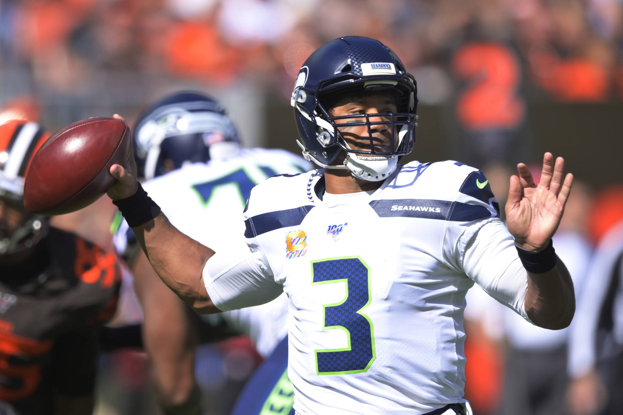 Seattle Seahawks quarterback Russell Wilson completed 23 of 33 passes for 299 yards and two touchdowns Sunday in a 32-28 win over the Cleveland Browns. (AP Photo/David Richard)