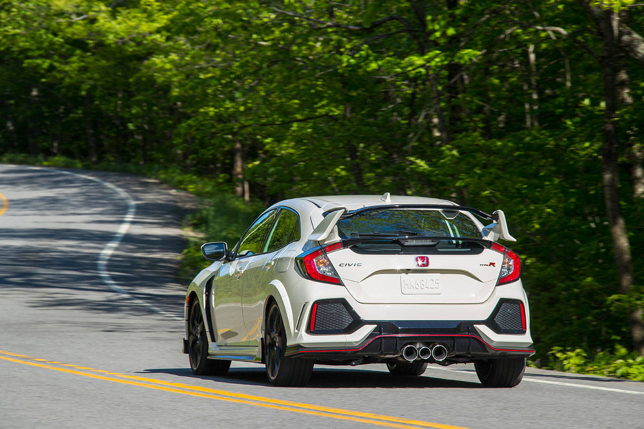 The 2019 Honda Civic Type R has seating for four passengers, and a rear cargo area with a retractable cover that completely blocks viewing from passersby. (Manufacturer photo)
