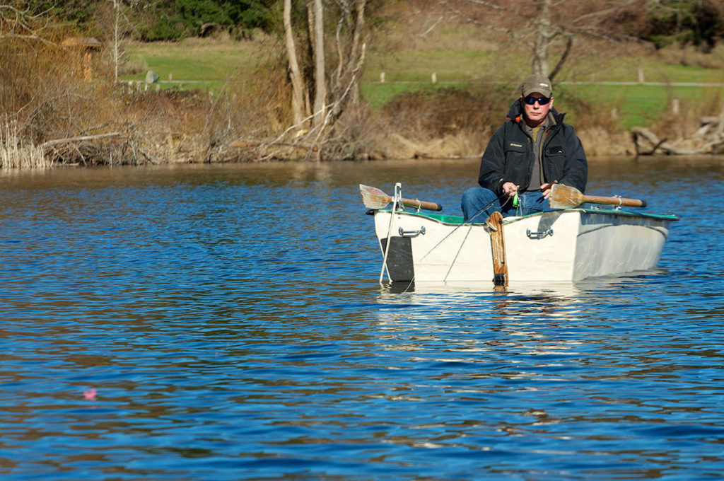 Dale Dennis of Arlington fishes a chironomid pupa pattern on Lone Lake. (Mike Benbow photo)

