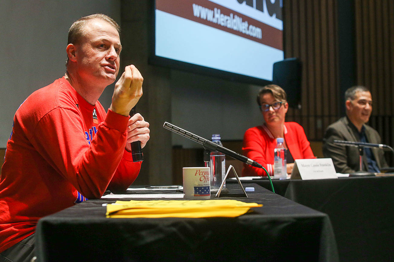 Sparks fly at I-976 debate: Eyman vs. a mayor and a senator