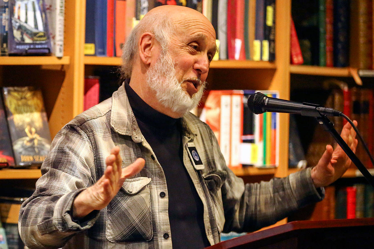 Steven Greenebaum talks about his new book, One Family: Indivisible at Third Eye Books in Lake Forest Park on October 1, 2019. (Kevin Clark / The Herald)