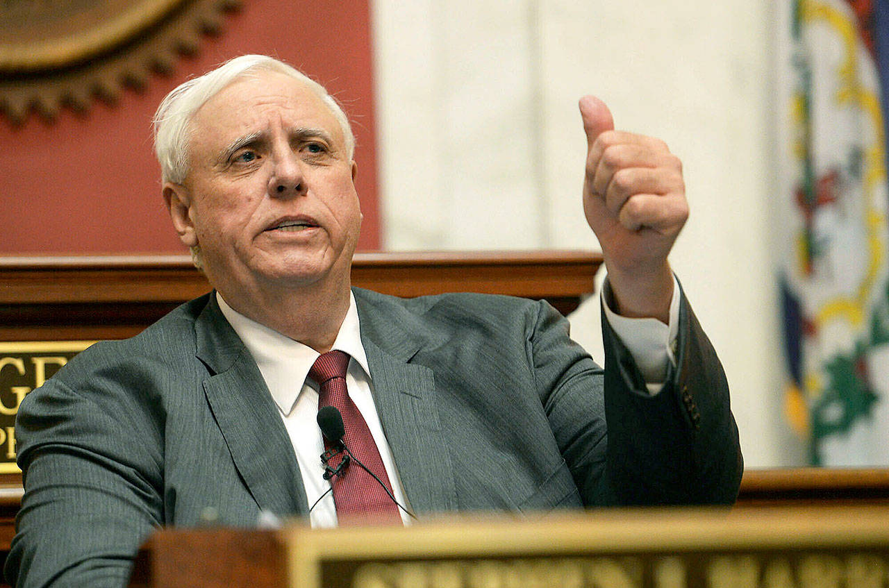 Gov. Jim Justice delivers his State of the State address in the House of Delegates’ Chamber in Charleston, West Virginia, earlier this year. A family business of West Virginia’s billionaire governor has maxed out a taxpayer-funded subsidy program meant to help farmers. (Chris Dorst/Charleston Gazette-Mail via AP, File)