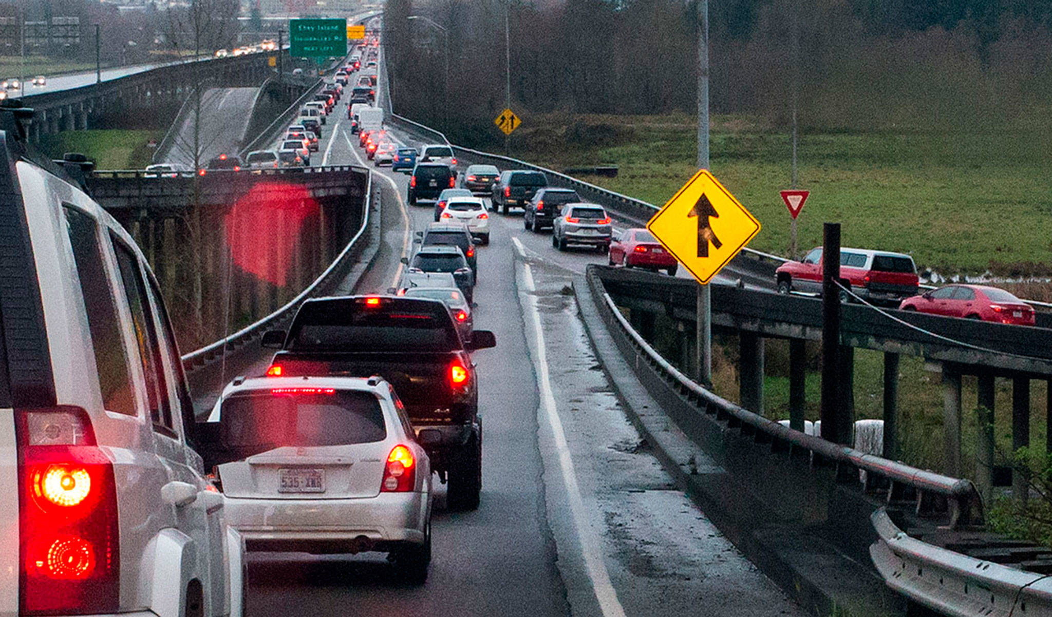 Westbound cars merge from Highway 204 and 20th Street SE onto the U.S. 2 trestle during the morning commute in March 2017. (Ian Terry / Herald file photo.