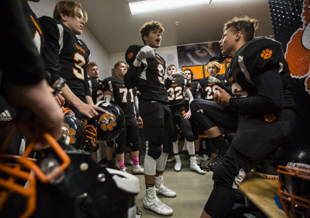 Granite Falls’ Mason McBride talks to his teammates before a game on Friday in Granite Falls. (Olivia Vanni / The Herald)
