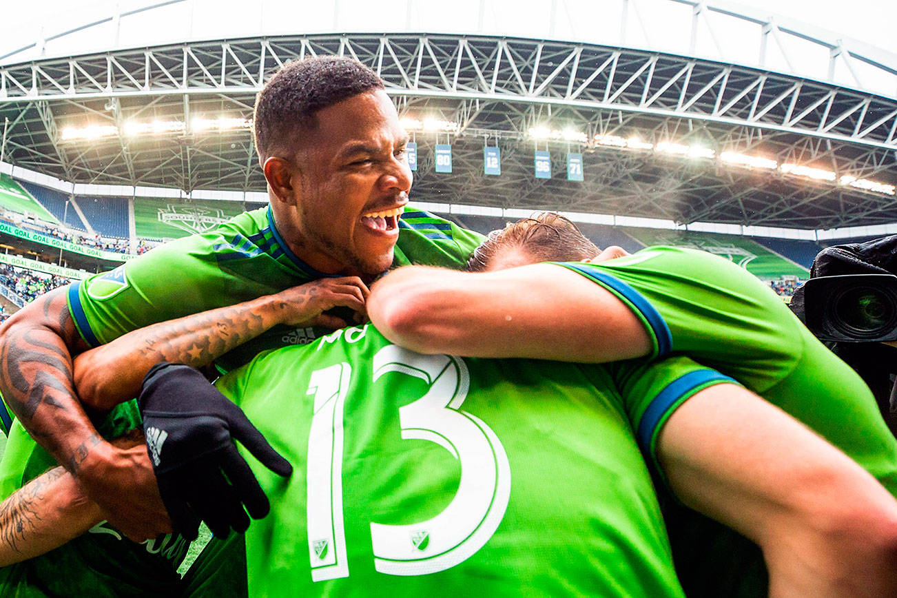 Morris’ hat trick lifts Sounders to playoff victory