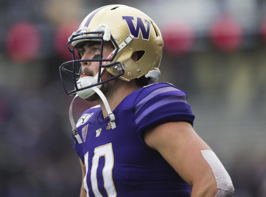 Washington’s Jacob Eason bites his lip as he looks up at the score board after Washington lost to Oregon 35-31 on Saturday, Oct. 19, 2019 in Seattle, Wash. (Olivia Vanni / The Herald)