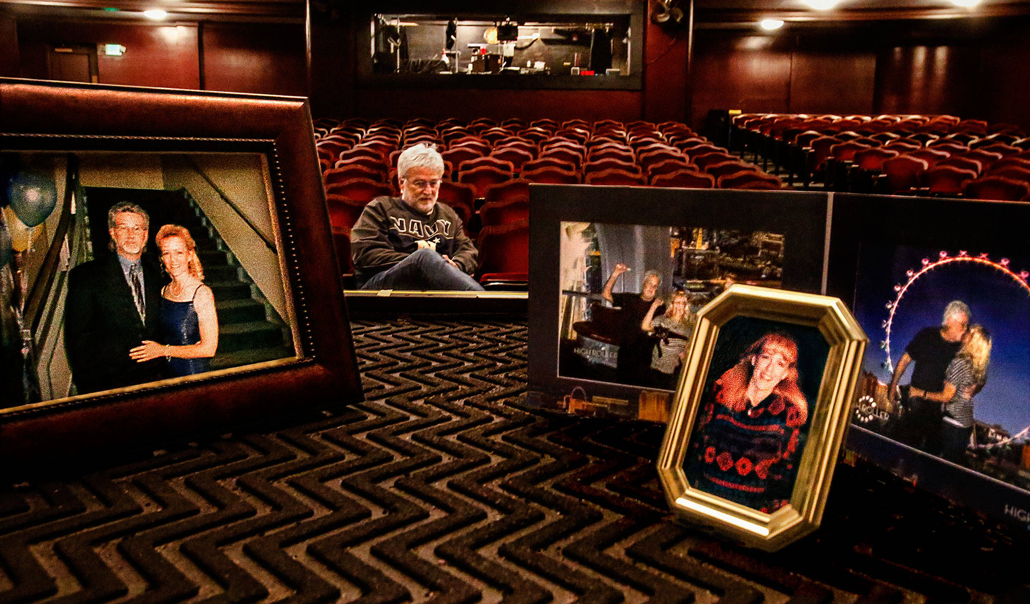Curt Shriner sits near the stage in the Historic Everett Theatre that his wife Laura loved. The theater’s box office manager and an actress, Laura Shriner died while in Las Vegas last Thursday with her husband. Curt is the theater manager. Some of his favorite pictures of her are near the front of the stage where she stood so many times. (Dan Bates / The Herald)