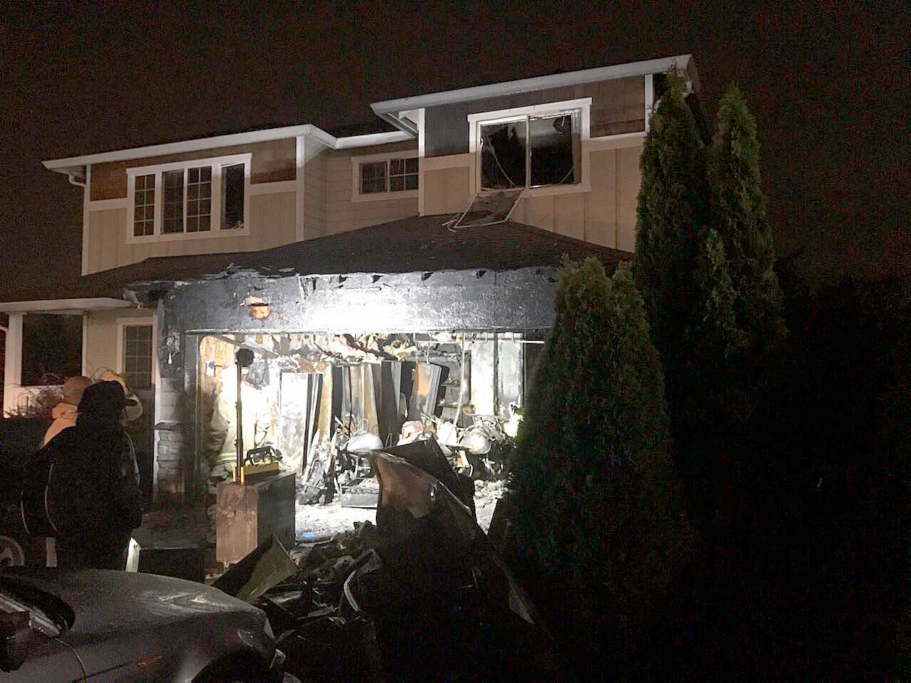 A home in Marysville was damaged midnight Tuesday in a fire that killed a dog. Four adults survived without injury. (Marysville Fire District)