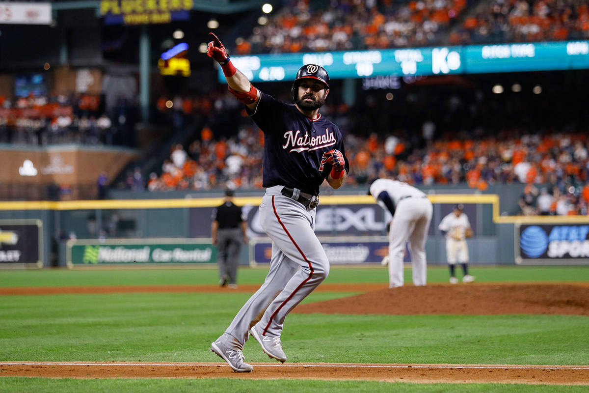 The Nationals’ Adam Eaton celebrates after hitting a home run off Astros relief pitcher Josh James during the eighth inning of Game 2 of the World Series on Wednesday in Houston. (AP Photo/Matt Slocum)