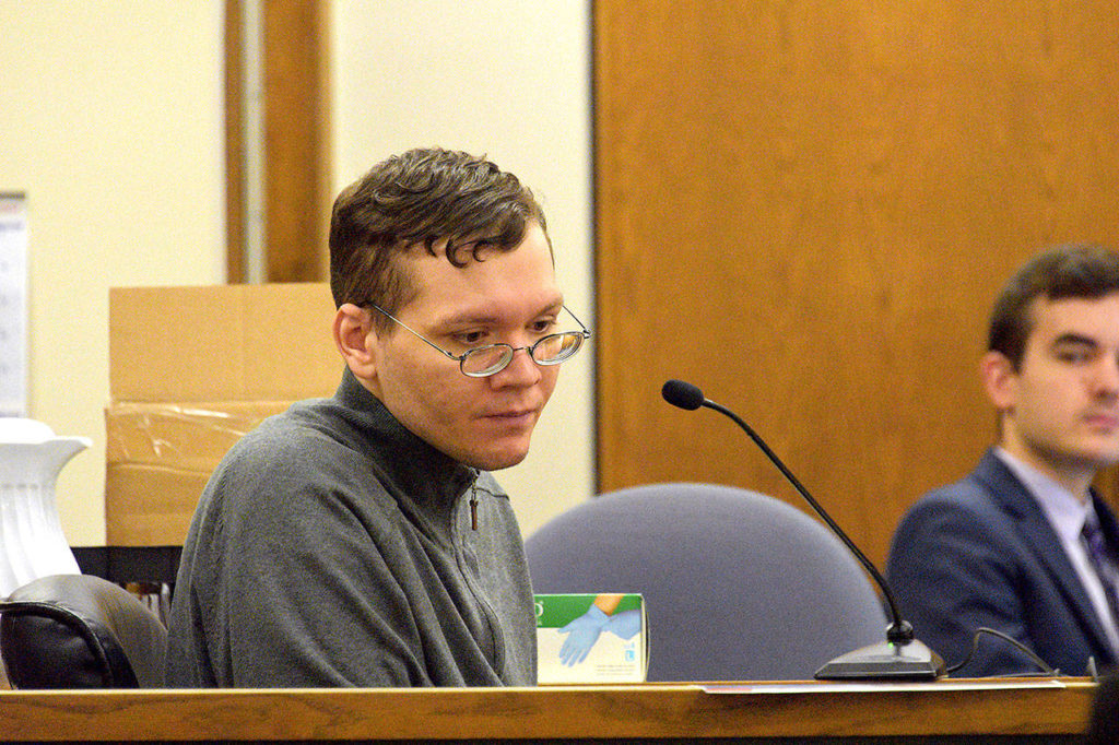 Anthony Garver glaces downward during his testimony Friday in Snohomish County Superior Court. (Caleb Hutton / The Herald)
