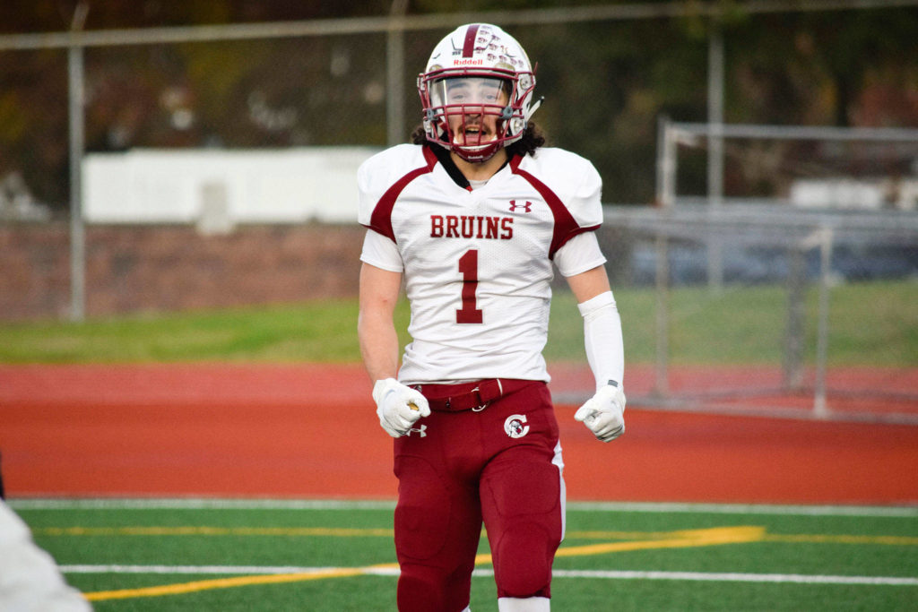 Junior running back Michael Purl smiles after running in for a touchdown against Mariner on Friday, Oct. 25 at Goddard Stadium in Everett. (Katie Webber / The Herald)
