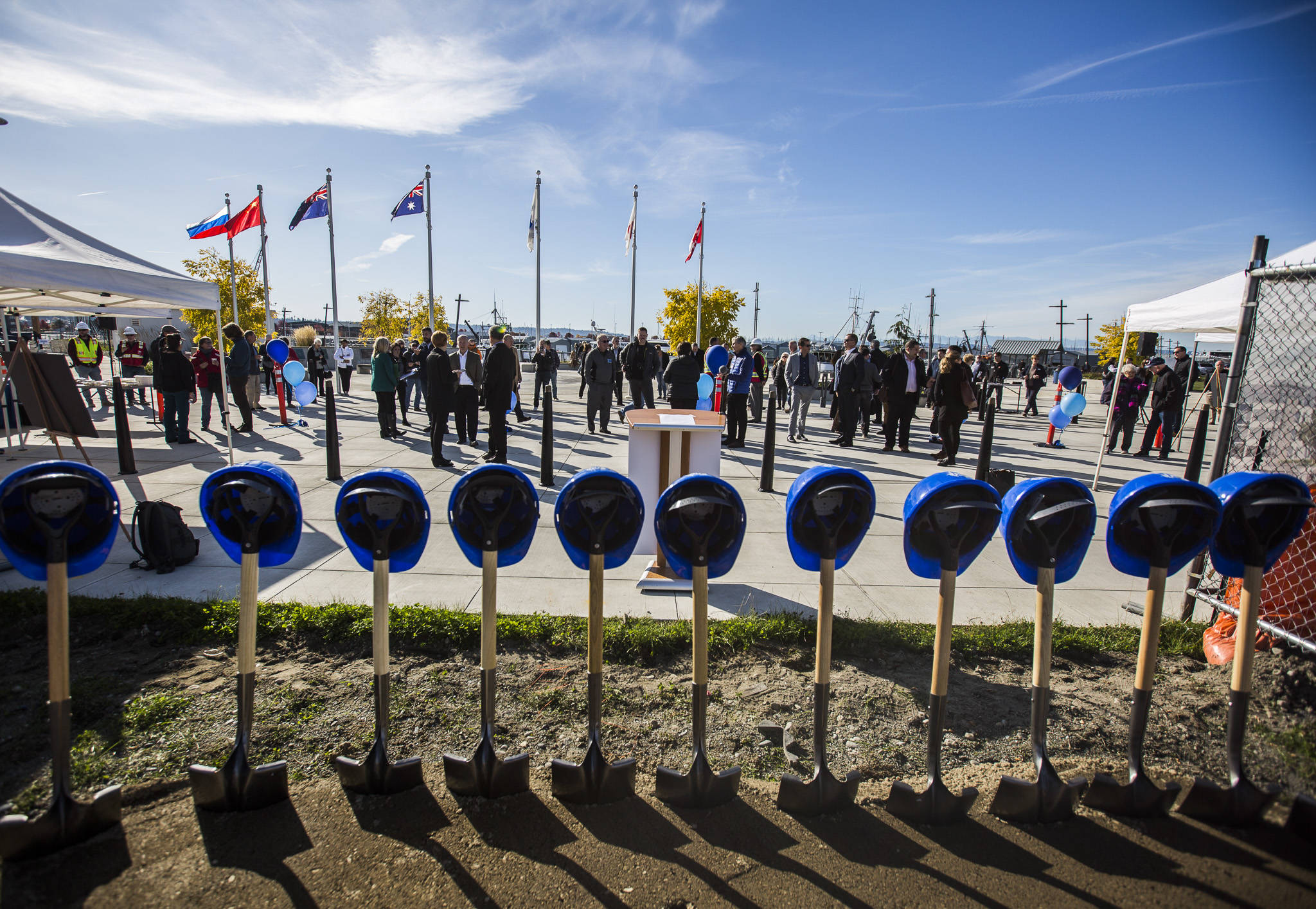 Helmets and shovels lined up at the groundbreaking for the Waterfront Place Apartments along the Everett waterfront Wednesday in Everett. (Olivia Vanni / The Herald)