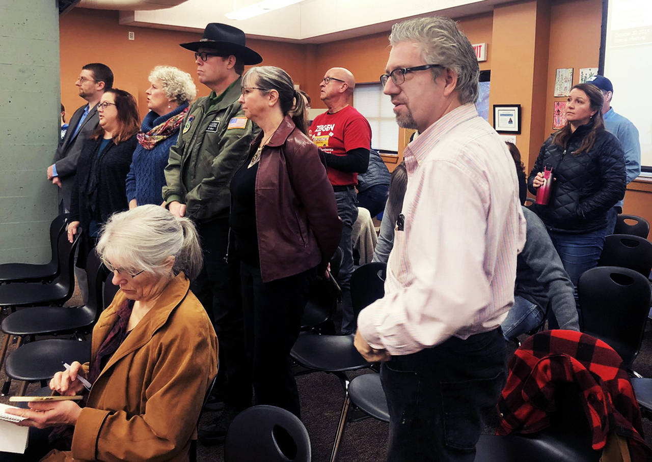After the Stanwood-Camano School Board went into executive session during its Wednesday morning meeting, members of the public requested the session be made public. (Julia-Grace Sanders / The Herald)