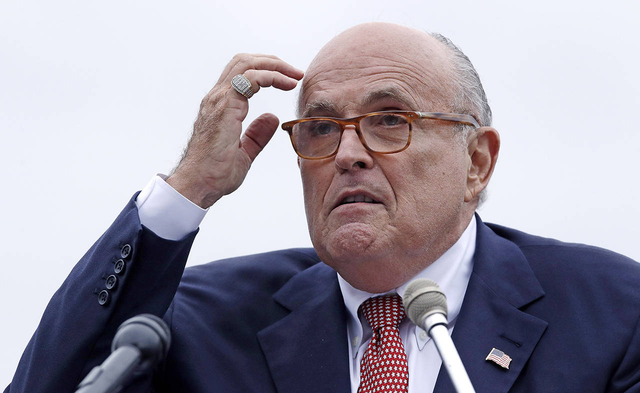 In this 2018 photo, Rudy Giuliani, attorney for President Donald Trump, addresses a gathering during a campaign event in Portsmouth, New Hampshire. (AP Photo/Charles Krupa, File )