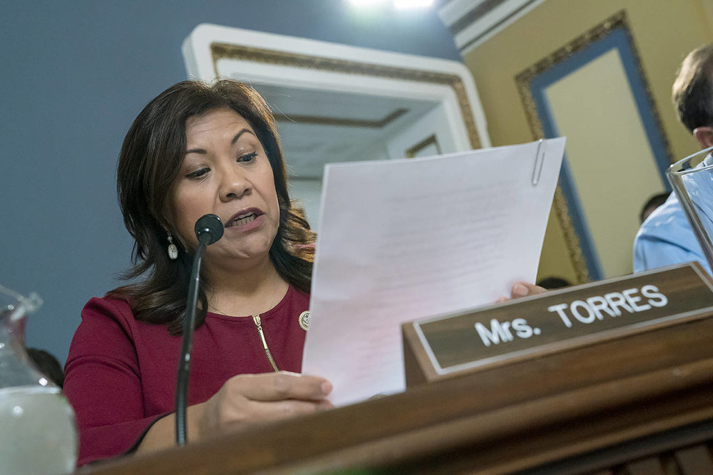 House Rules Committee member Rep. Norma Torres, D-Calif., argues a point as the panels holds a markup of the resolution that will formalize the next steps in the impeachment inquiry of President Donald Trump at the Capitol in Washington on Wednesday. (AP Photo/J. Scott Applewhite)
