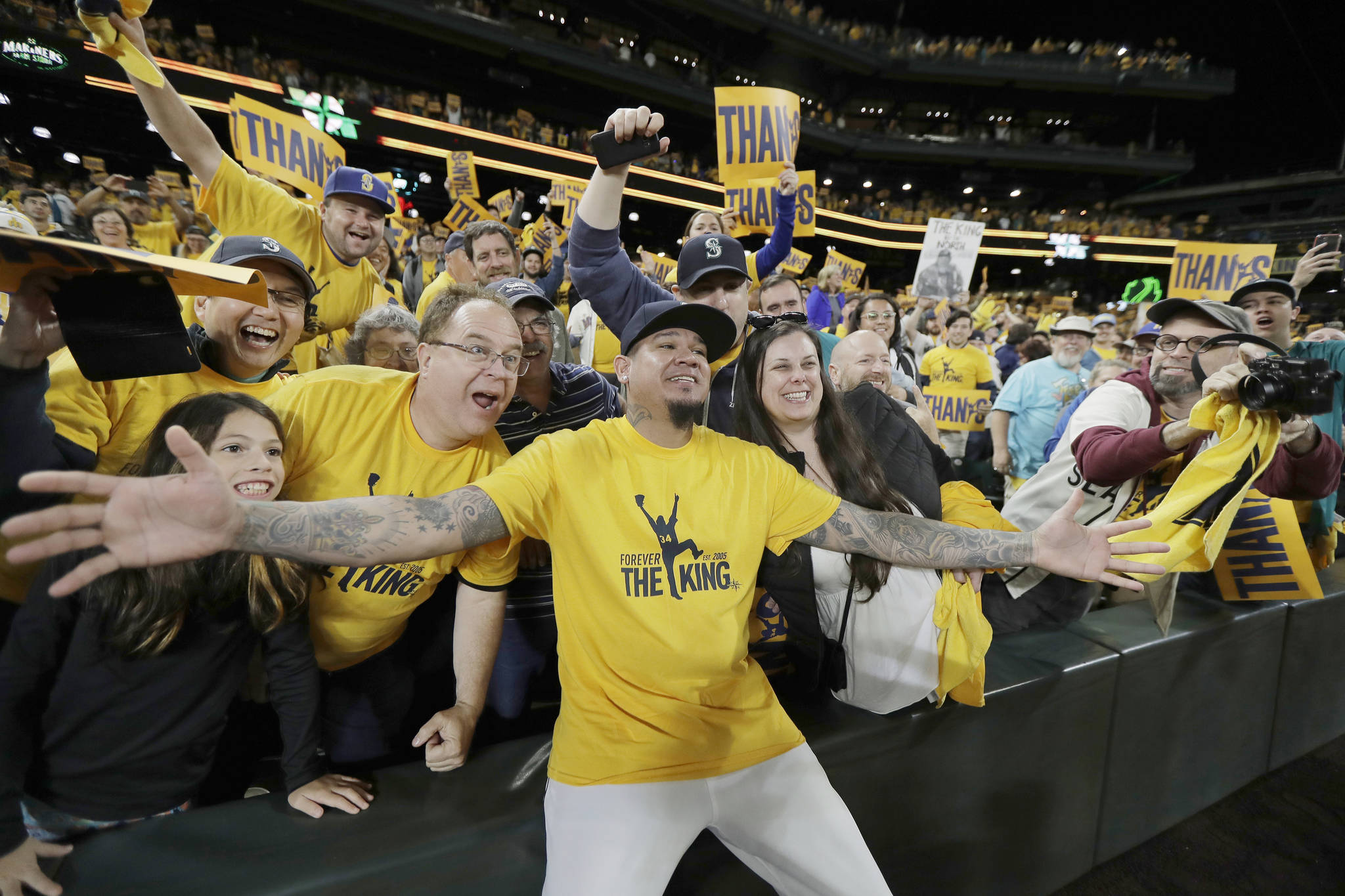 Seattle Mariners starting pitcher Felix Hernandez poses for photos with fans following the team’s baseball game against the Oakland Athletics, Thursday, Sept. 26, 2019, in Seattle. The Athletics won 3-1. (AP Photo/Ted S. Warren)