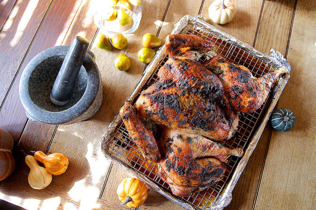 You can roast a spatchcocked turkey on one sheet pan, with a wire rack for drainage. (Kirk McKoy / Los Angeles Times)
